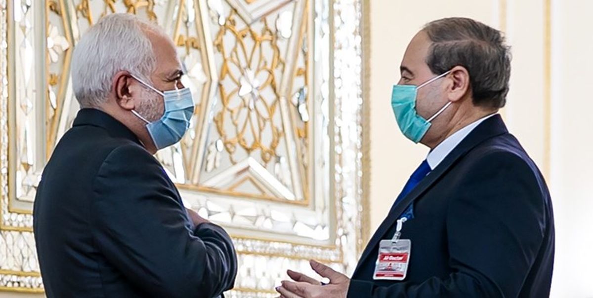 دعوت المقداد از ظریف برای سفر به سوریه