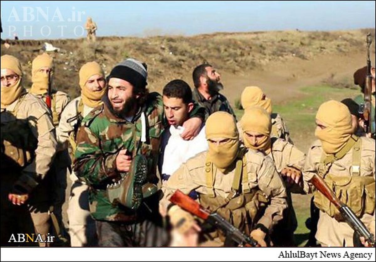 خلبان اردنی در اسارت داعش/عکس