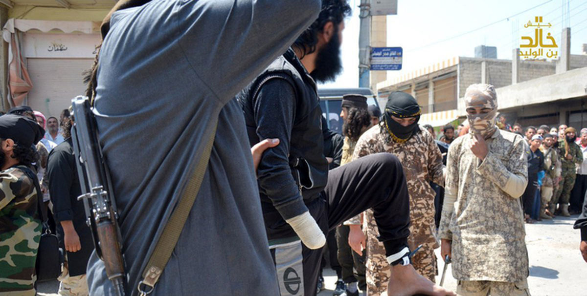 قطع دست و پای مردسوری توسط داعش+تصاویر