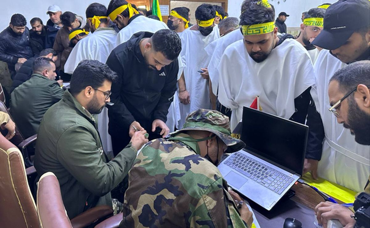 ازدحام در بغداد برای دفاع از ایران