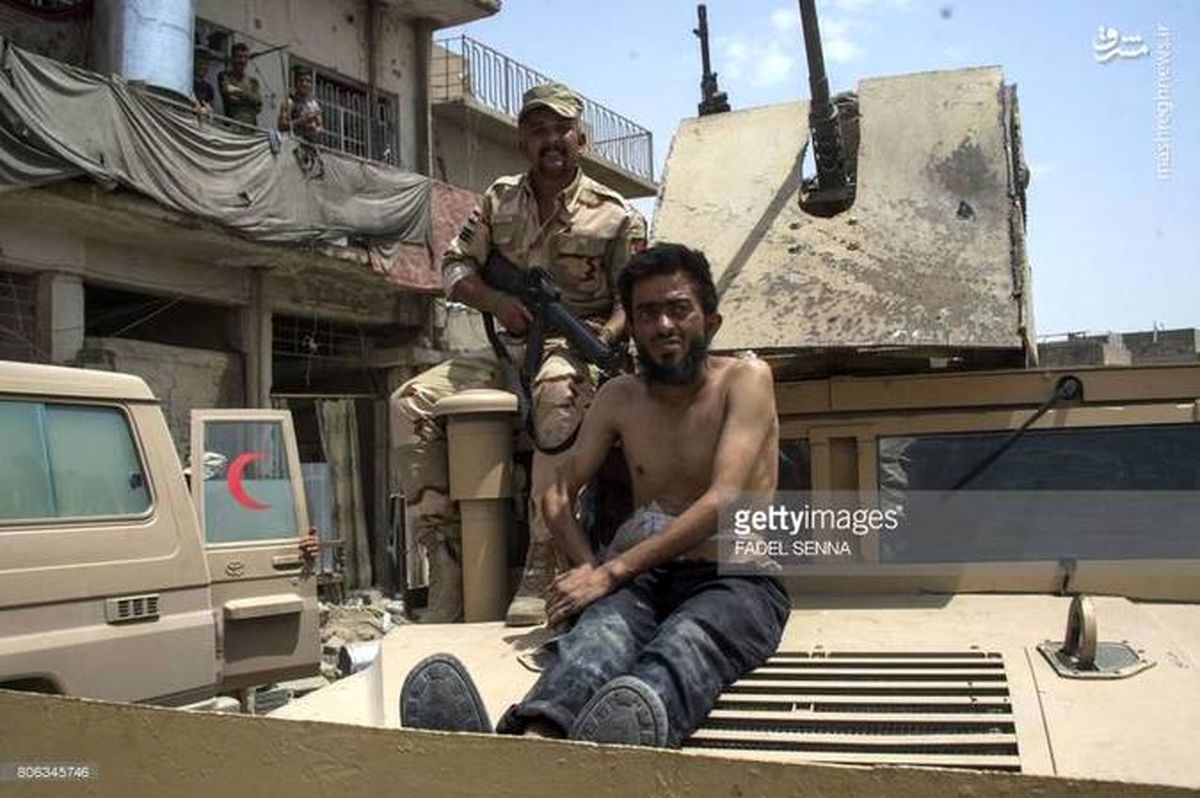 گرداندن یک داعشی در موصل +تصاویر