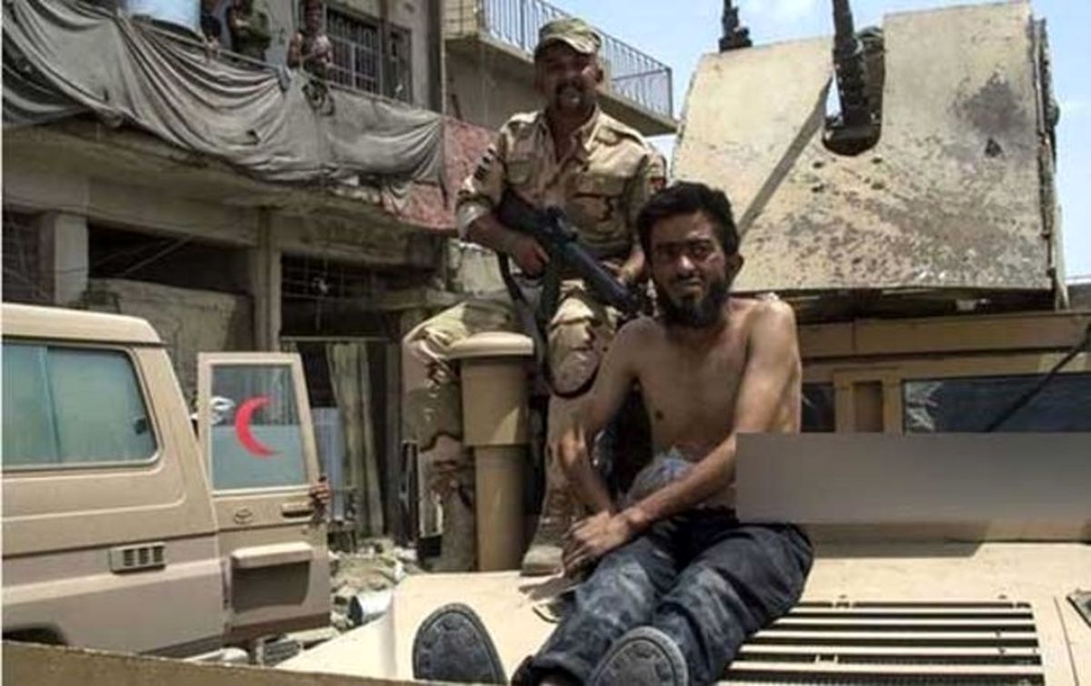 گرداندن اسیر داعشی در شهر +عکس