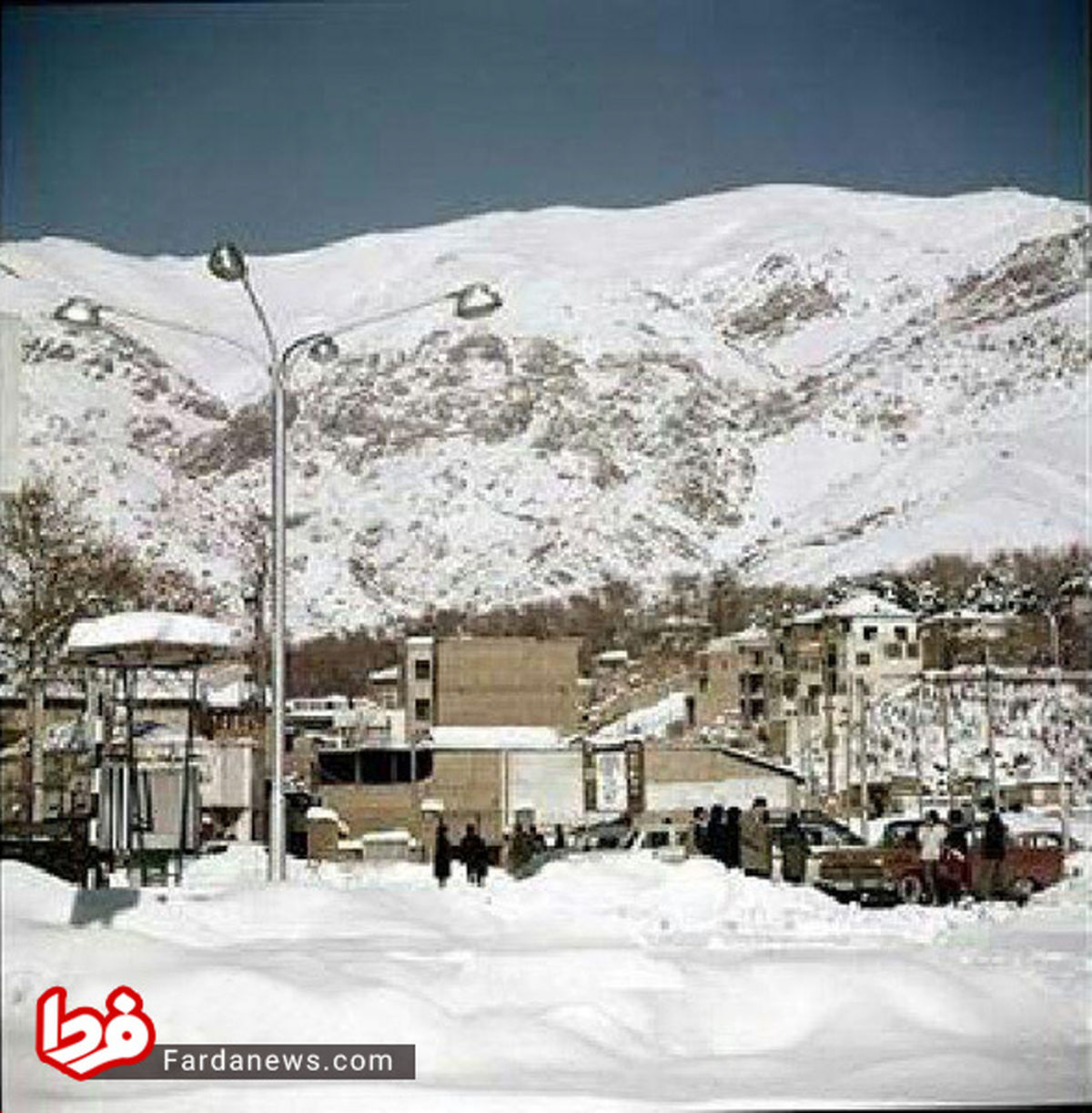 عکس رنگی از تجریش در یک روز برفی در سال ۱۳۳۶