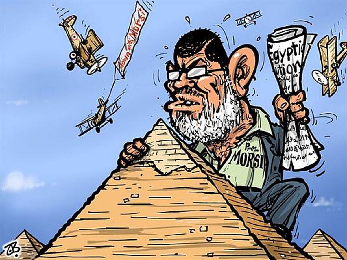 مرسی از لنز کاریکاتوریست‌ها