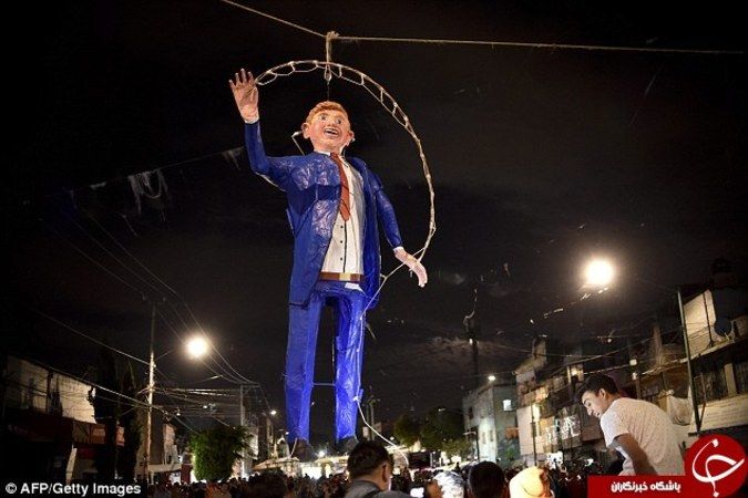 آتش زدن آدمک ترامپ در جشن عید پاک +تصاویر